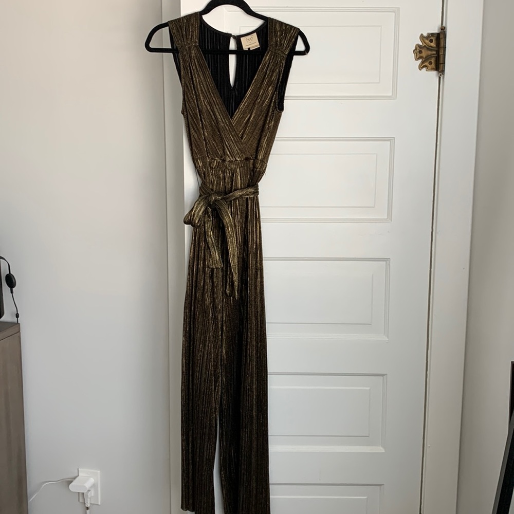 Anthropologie black and gold jumpsuit